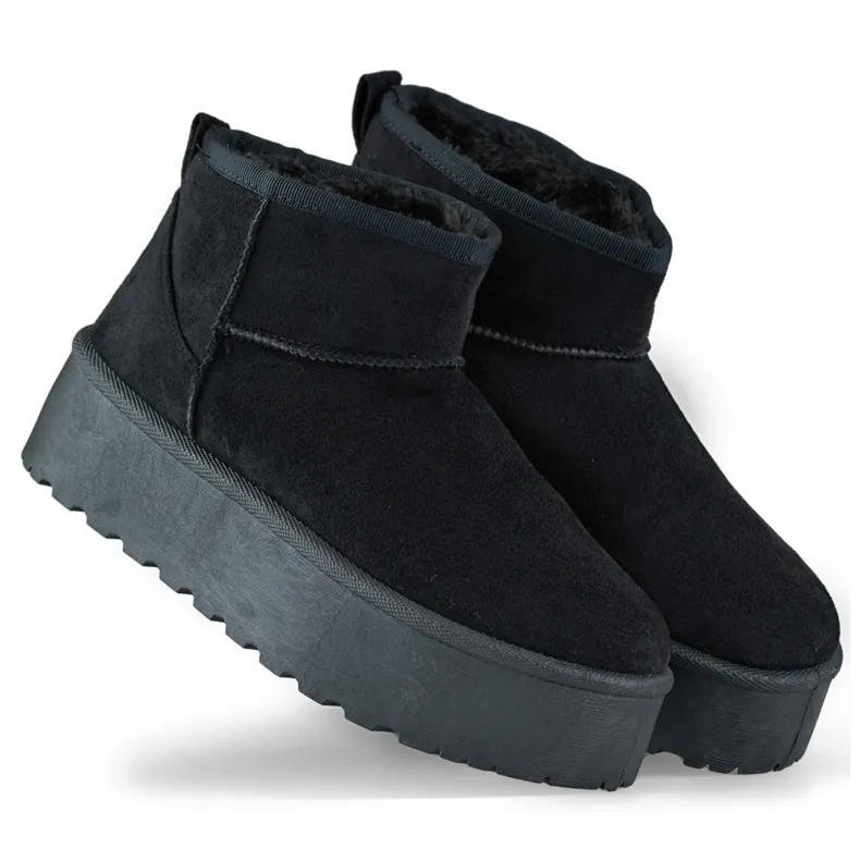 Black snow boots with a thick sole